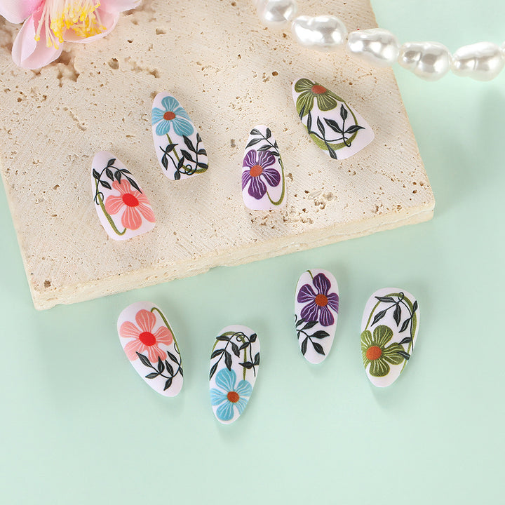 Artificial nails with floral accent Stornfield