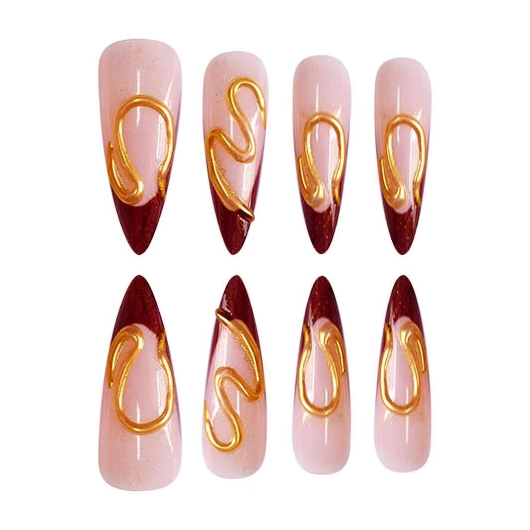 Artistic Stiletto Nail Extensions with Abstract Design Stornfield