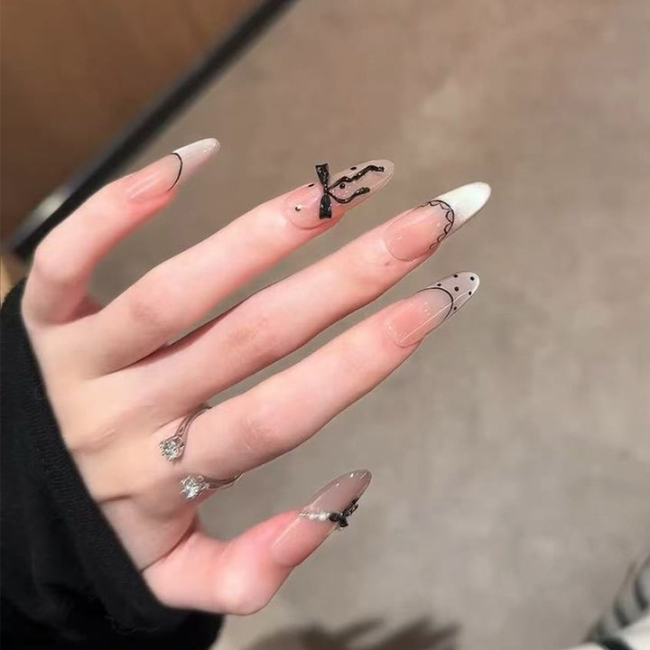 Artistic Press-On Nail Set with Elegant Bow and Pattern Details Stornfield