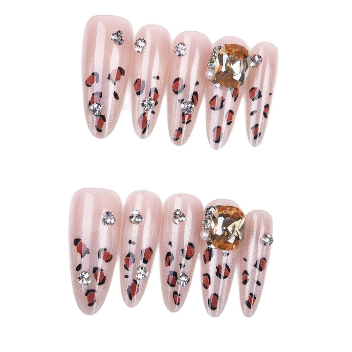 Artificial nails with elegant leopard motif and glitter details Stornfield