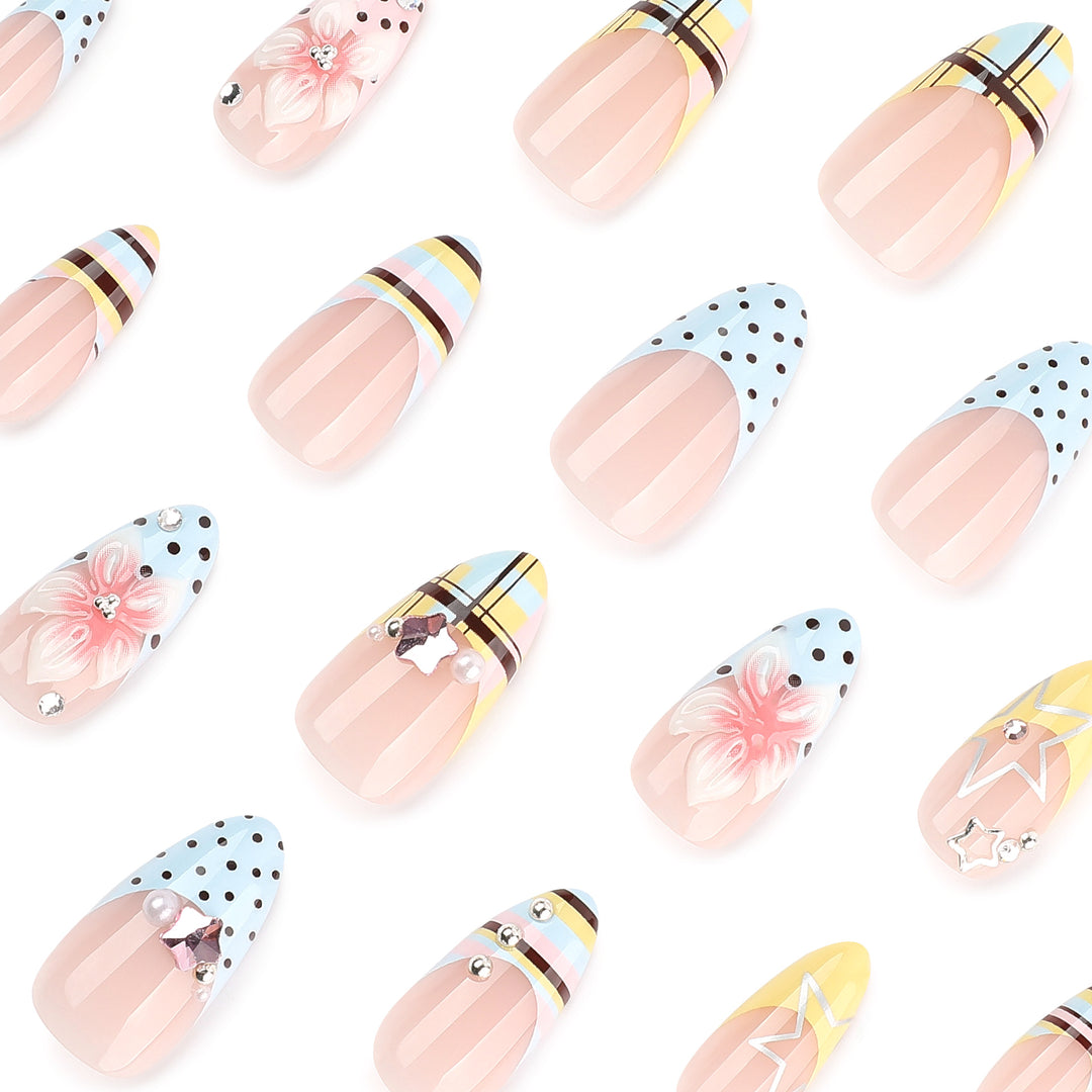 Creative nail designs with floral accents and glitter Stornfield