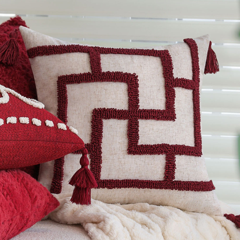 Rectangular decorative cushion with bouclé relief and tassels Stornfield