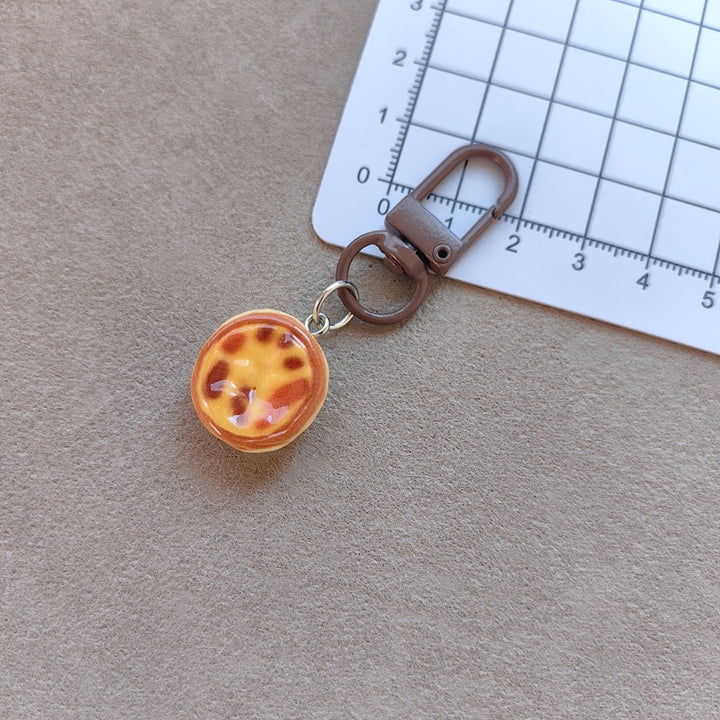 Keychain with cute cake design Stornfield