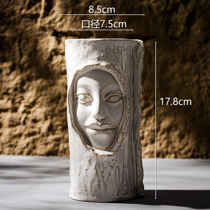 Handmade ceramic sculptural face-stem cylindrical flower pot with textured glaze