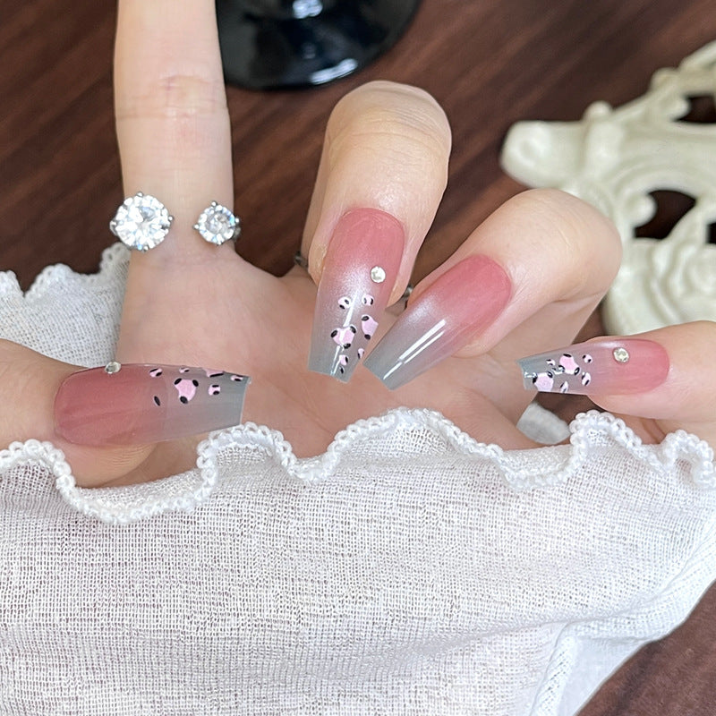 Artistic Nail Design with Elegant Floral Accents Stornfield