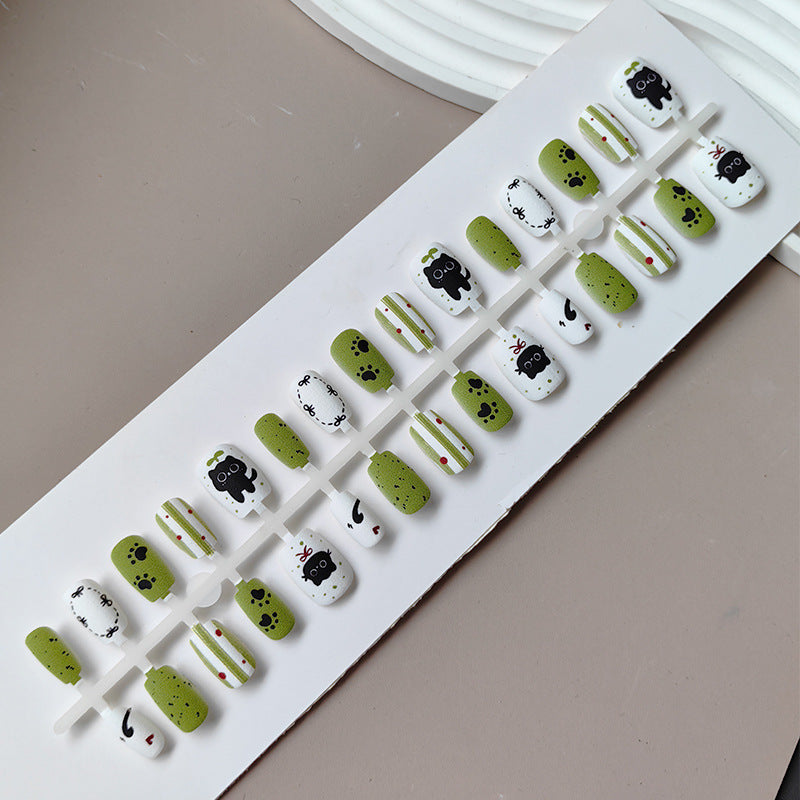 Creative art press-on nails with playful animal design Stornfield
