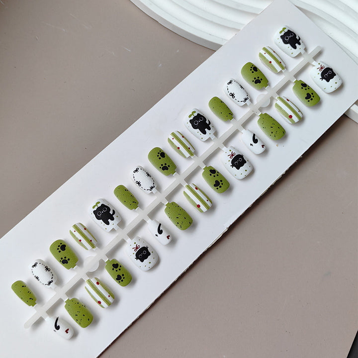 Creative art press-on nails with playful animal design Stornfield