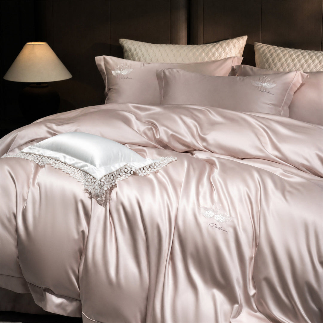 Luxurious satin bedding set with embroidered swan motif and lace pillow