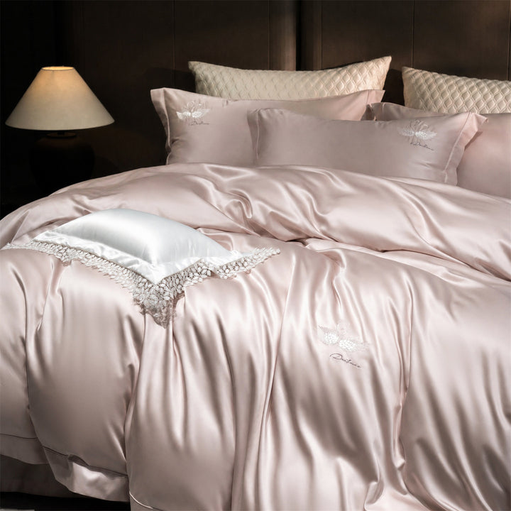 Luxurious satin bedding set with embroidered swan motif and lace pillow