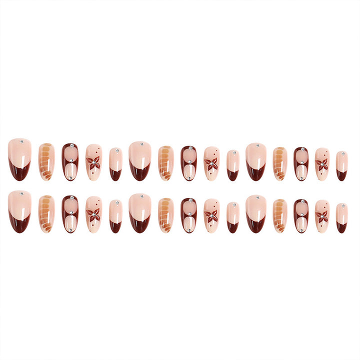 Artificial nails with elegant motif designs Stornfield