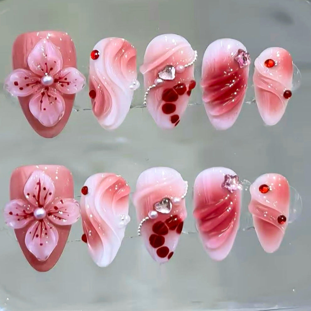 Artistic Press-On Nail Set with Floral and Gem Details