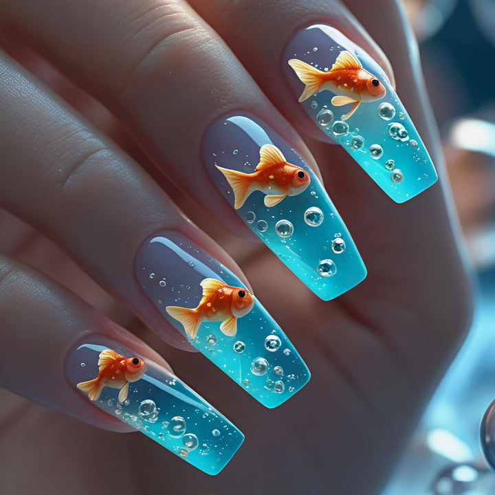 Artificial nail design with golden fish Stornfield