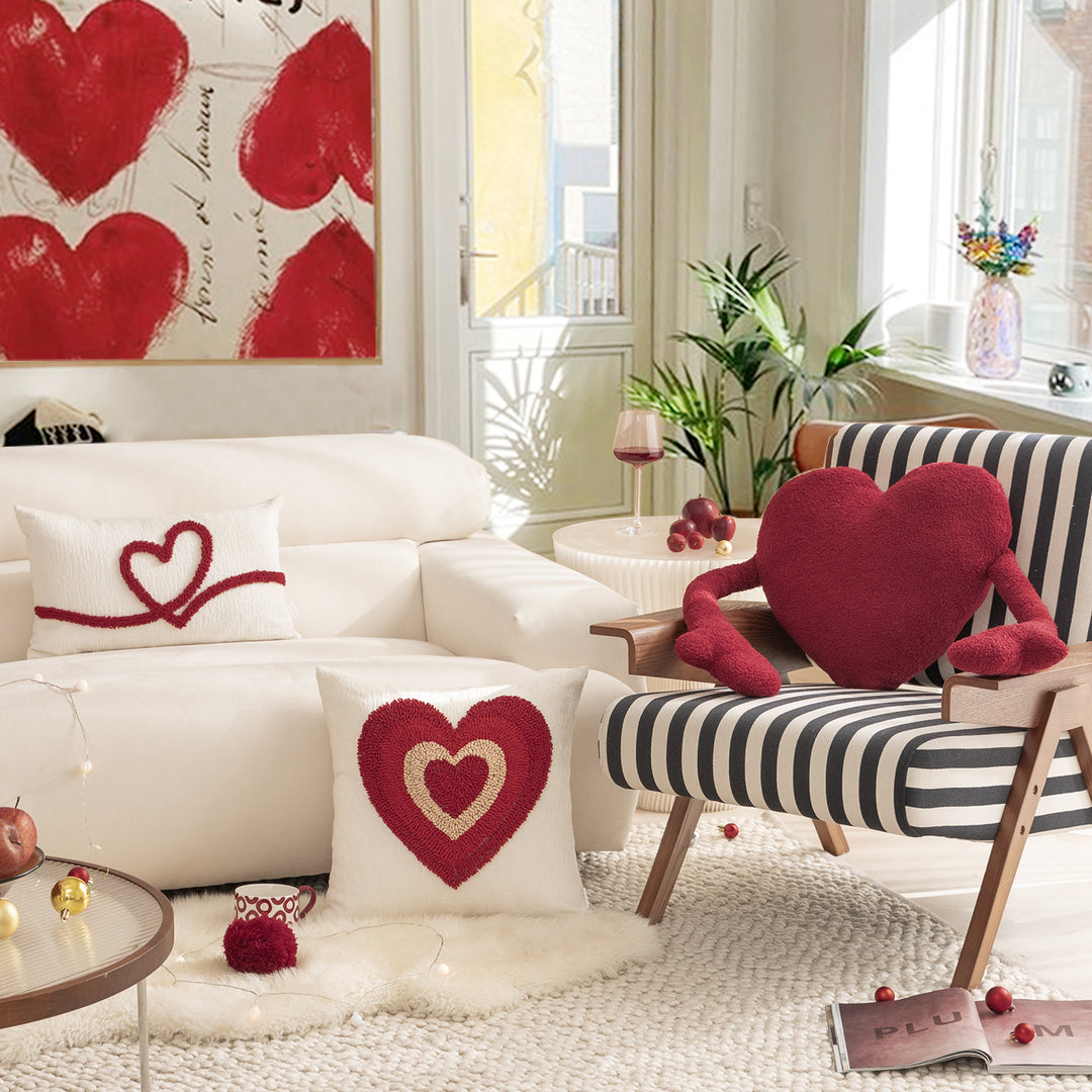 Heart-shaped cuddle cushion with extended arm applications Stornfield