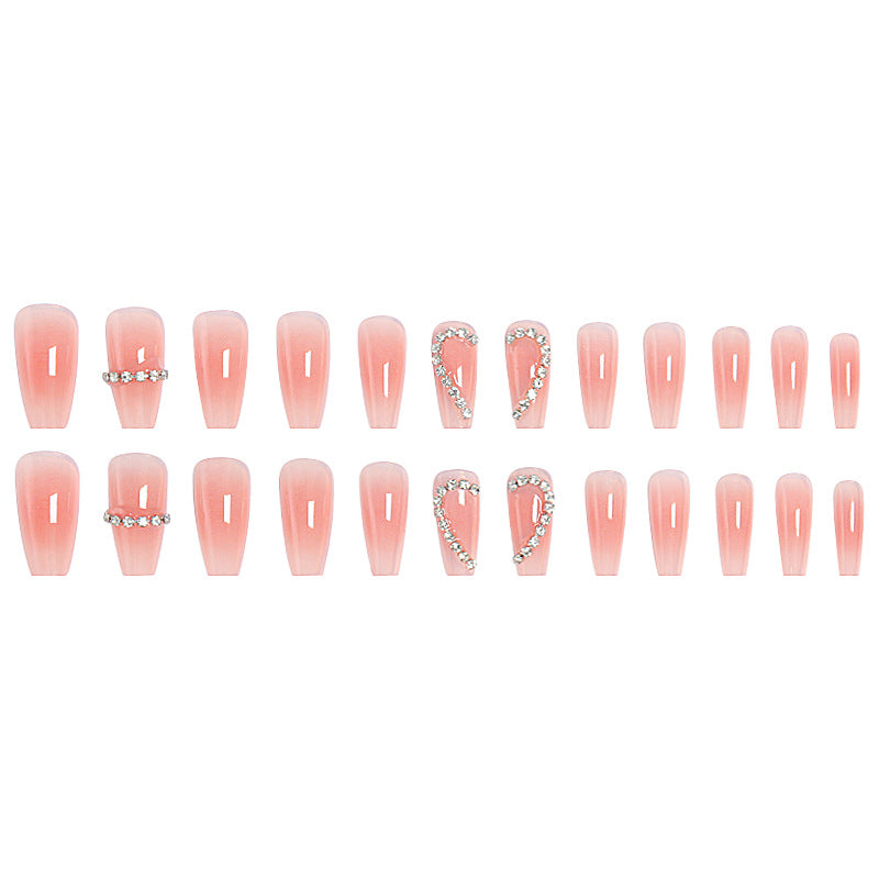 Artificial nails with romantic heart decorations Stornfield