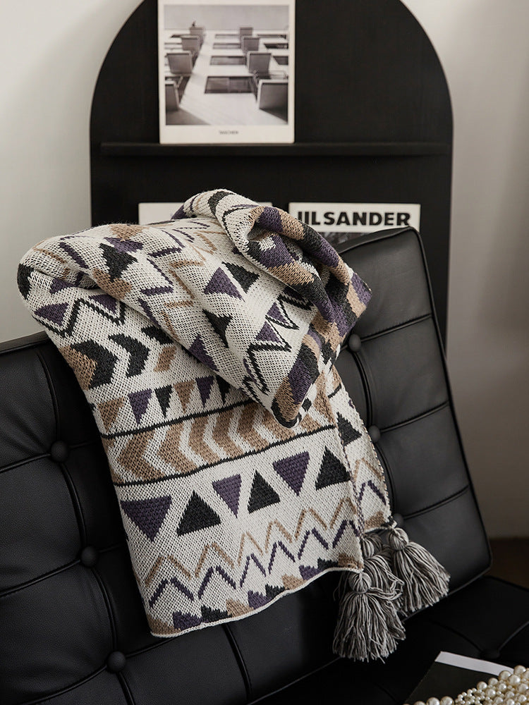 Patterned throw blanket in ethnic knit design with tassels