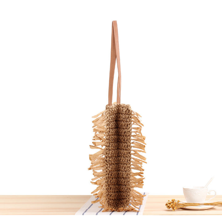 Beach bag with fringes and sturdy leather handles Stornfield