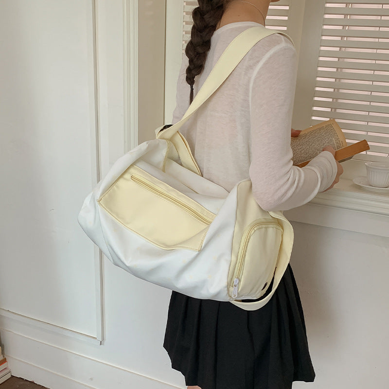 Sporty shoulder bag with practical slip pockets Stornfield