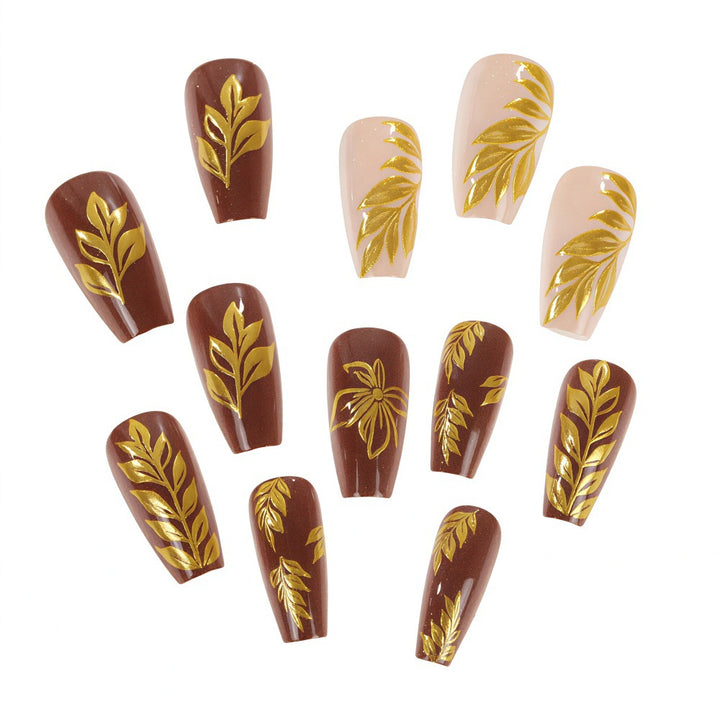Artificial nails with floral gold design Stornfield