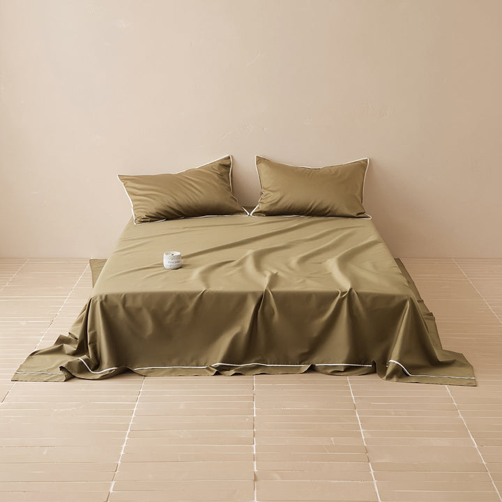 Noble cotton satin bed sheet and pillowcase set with fine piping