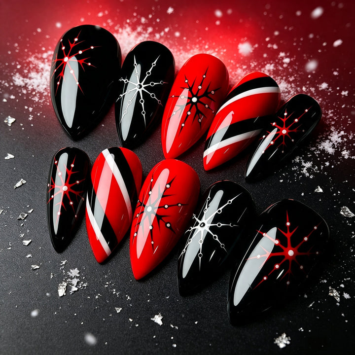 Artificial nails in modern stiletto design with graphic accents Stornfield