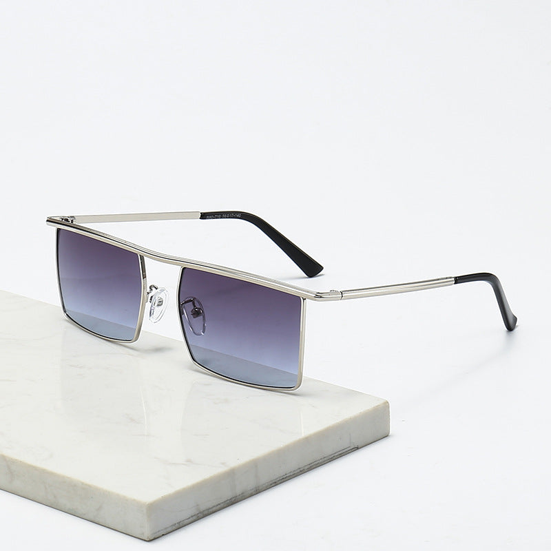 Women's fashionable sunglasses with intricate, rectangular frame Stornfield
