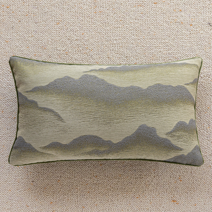 Elegant decorative pillow with elaborate mountain motif