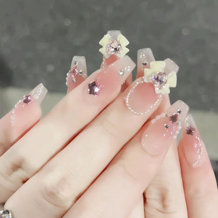 Glittering artificial nails with moon and star motifs Stornfield