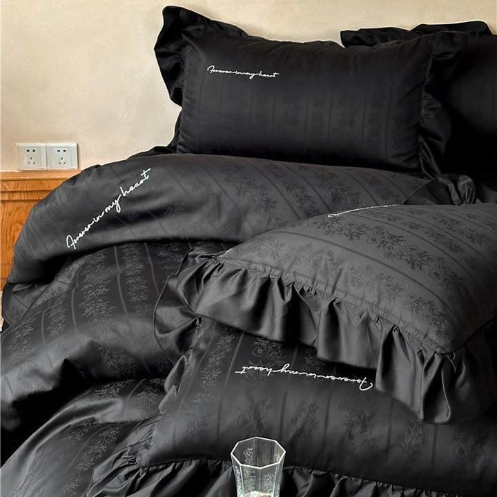 Luxurious satin bedding set with ruffles and jacquard floral pattern