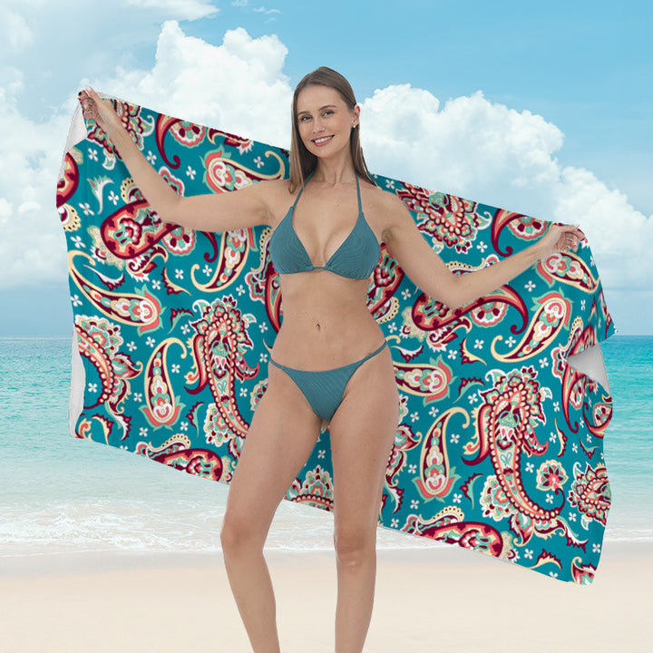 Beach towel with vibrant tropical plant motif Stornfield