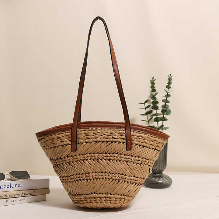 Braided basket bag with innovative leather handles Stornfield