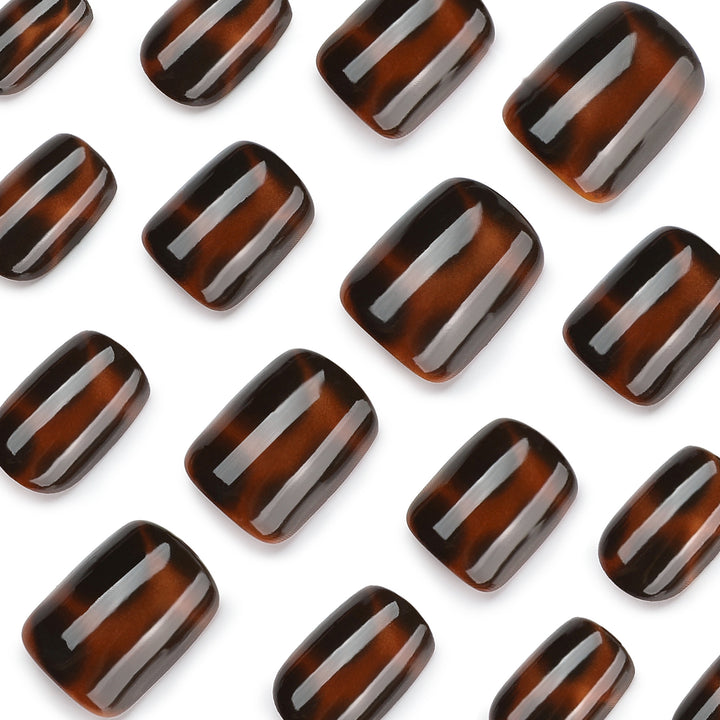 Artificial nail extensions with elegant tortoiseshell decor Stornfield