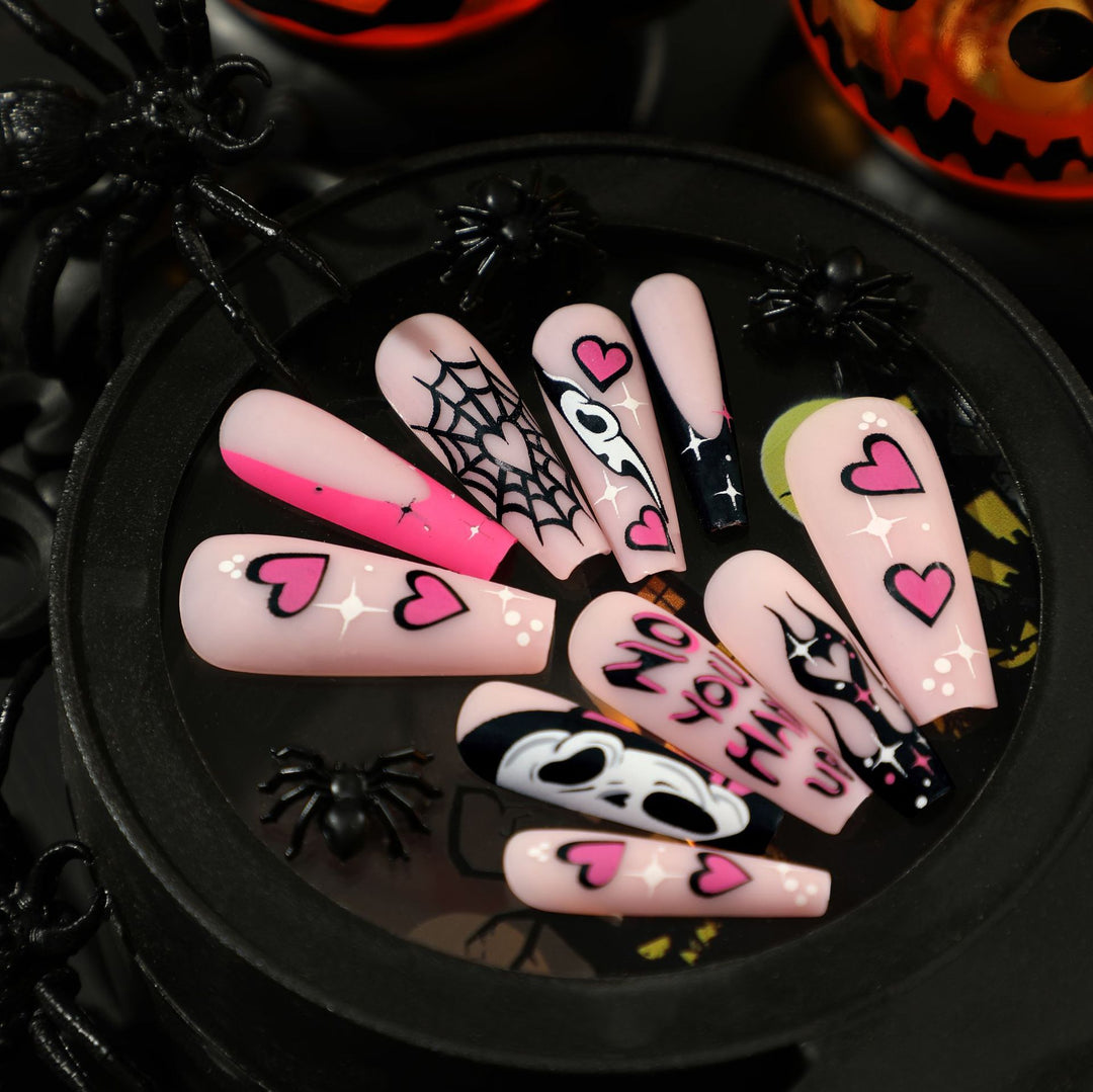 Artificial nail art with Halloween motif and unique embellishments Stornfield