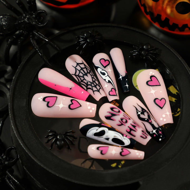 Artificial nail art with Halloween motif and unique embellishments Stornfield