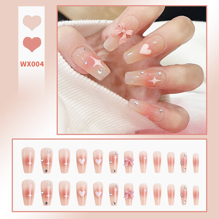 Elegant Nail Art with Glitter and Rhinestones Stornfield