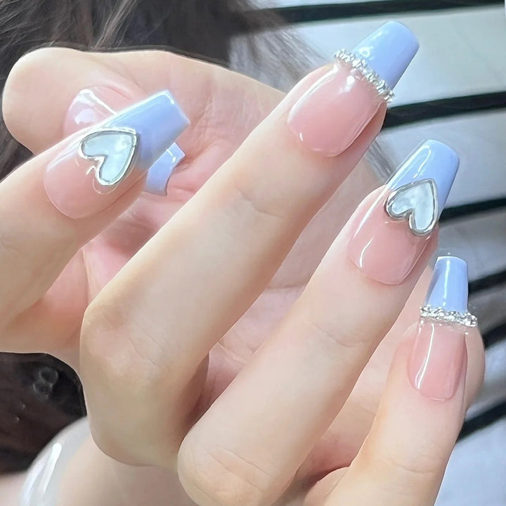 Artificial nails with romantic heart and glitter decorations Stornfield