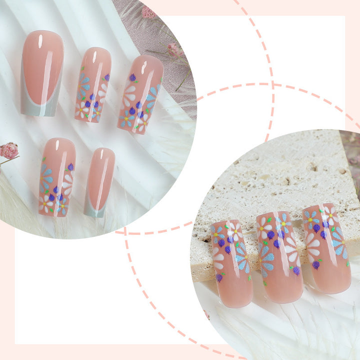 Creative nail art set with floral and shiny accents Stornfield
