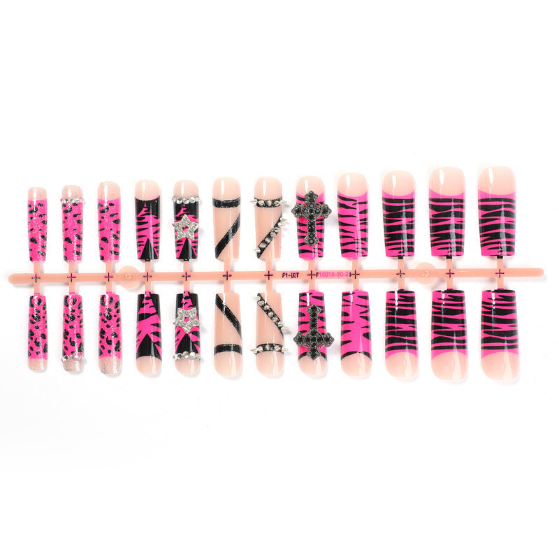 Artificial nail set with striking animal and glitter designs Stornfield