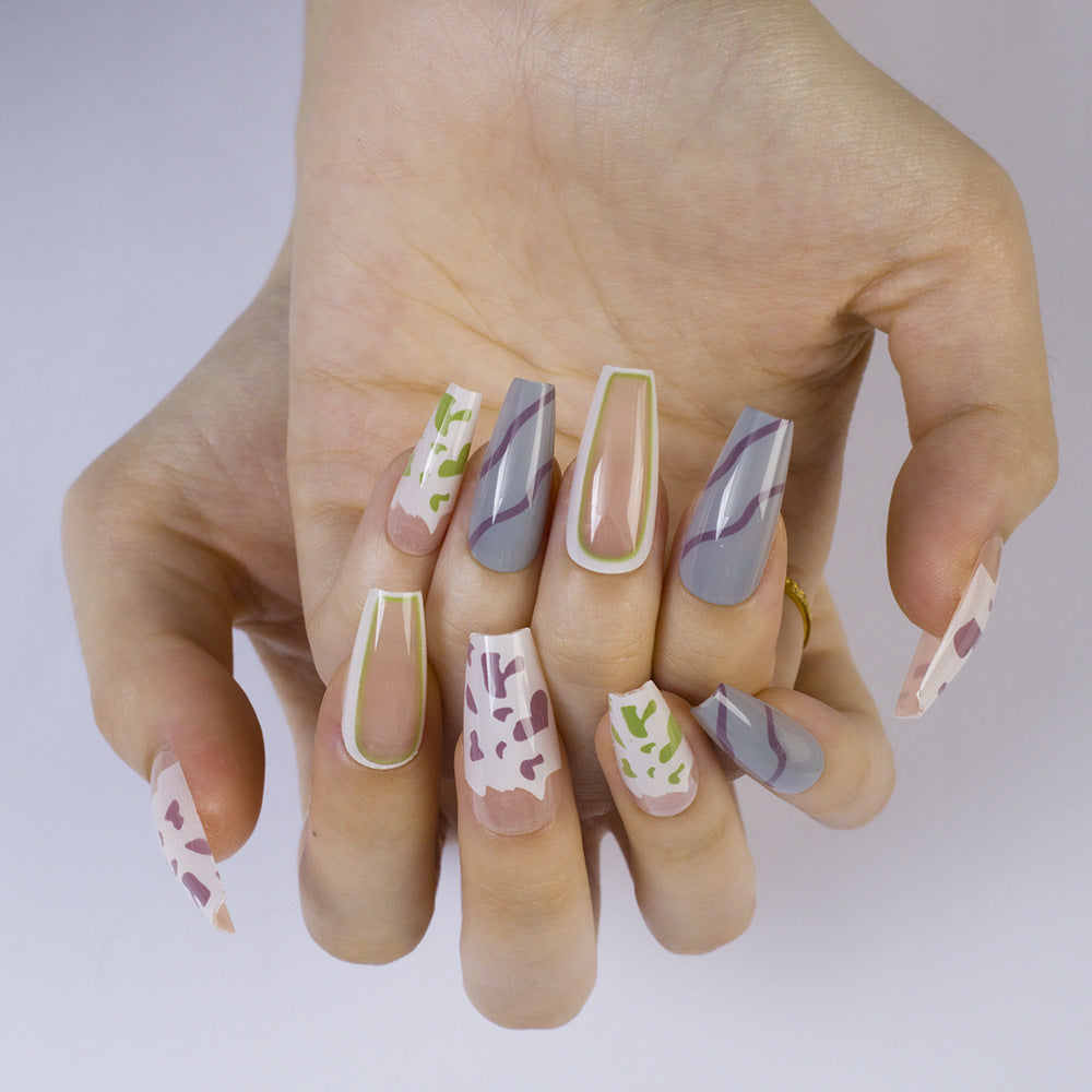 Artificial nails in modern design with geometric patterns Stornfield