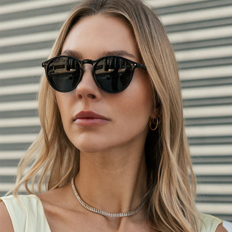 Women's fashionable round sunglasses with transparent frame and UV protection Stornfield