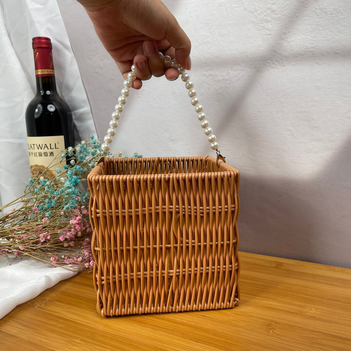 Women's stylish rattan container with pearl handle Stornfield