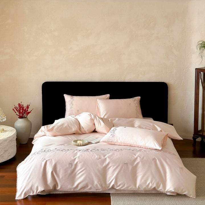 Elegant satin bedding set with fine floral embroidery and reversible design
