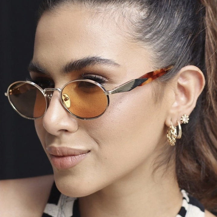 Women's designer sunglasses with unique oval frame and luxurious accents Stornfield