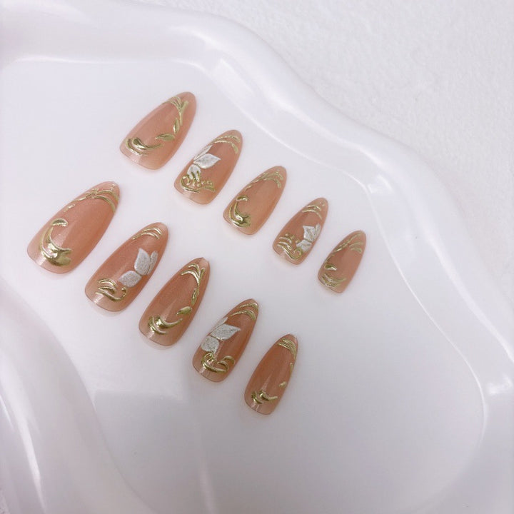 Elegant artificial nails with marble and gold accents Stornfield
