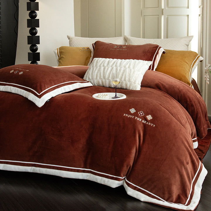 Velvety duvet cover set with embroidered floral design and contrasting piping