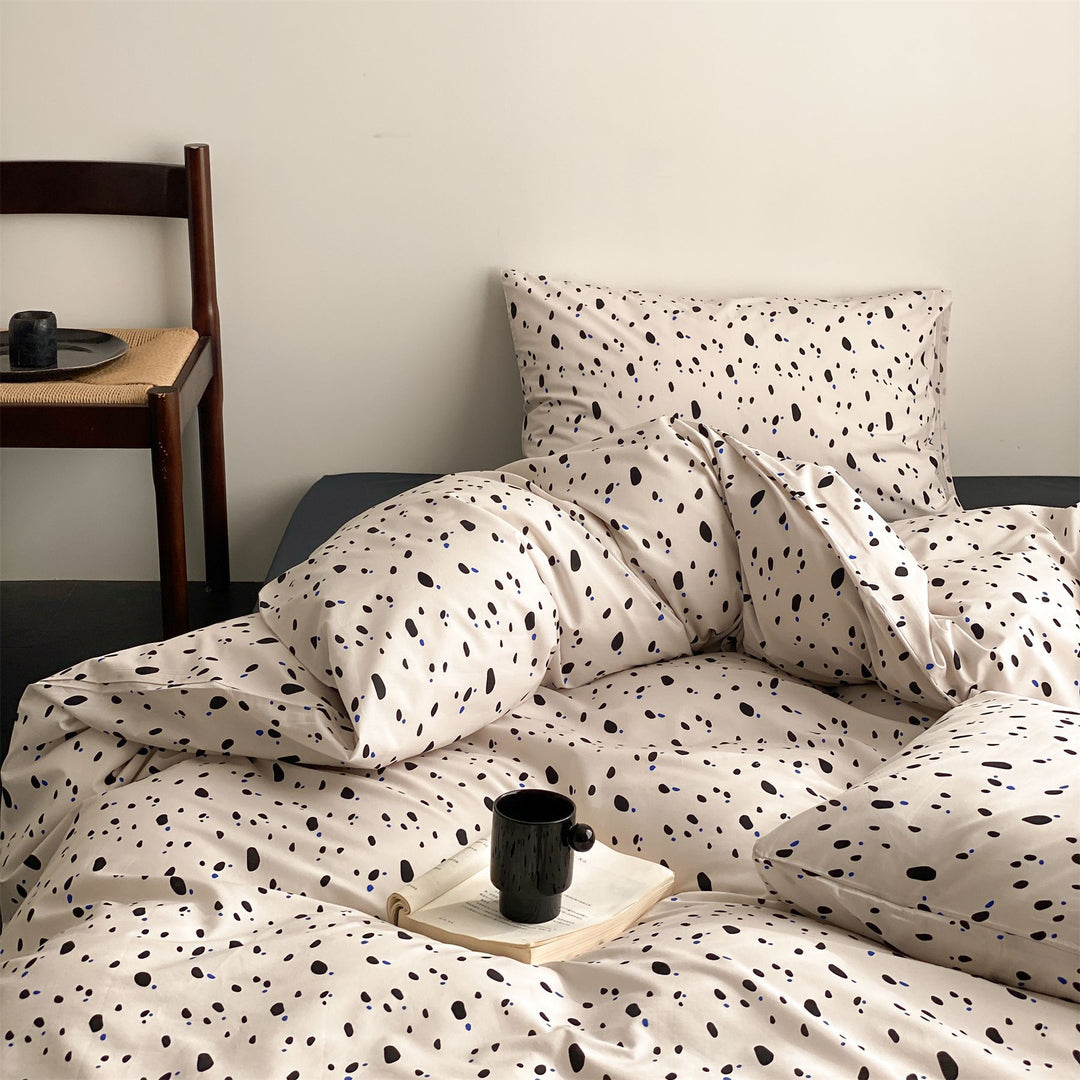 Reversible Mako cotton satin duvet cover set with minimalist dotted terrazzo look