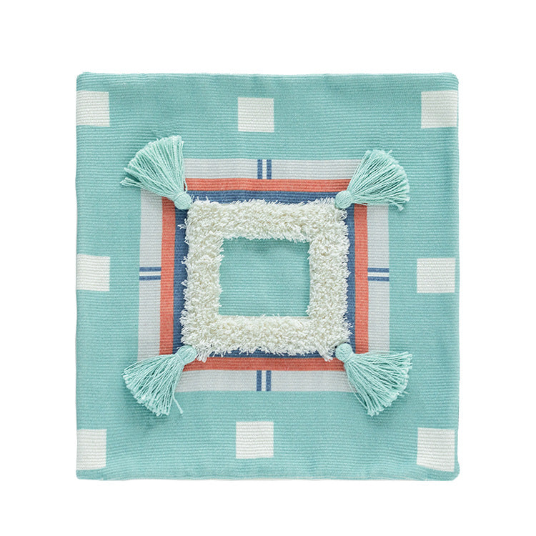 Square Boho decorative pillow with crocheted pom-pom and decorative corner tassels