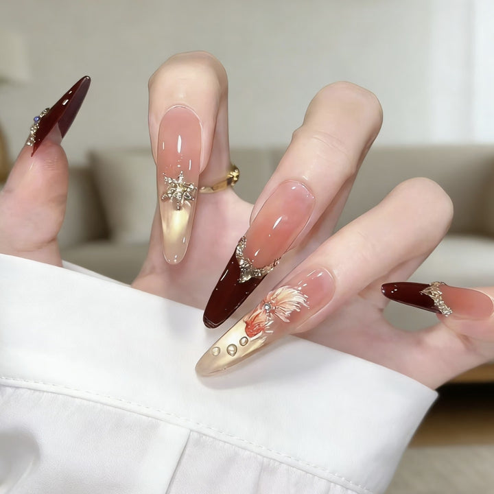Elegant Stiletto Nail Art Extensions with Decorative Accents