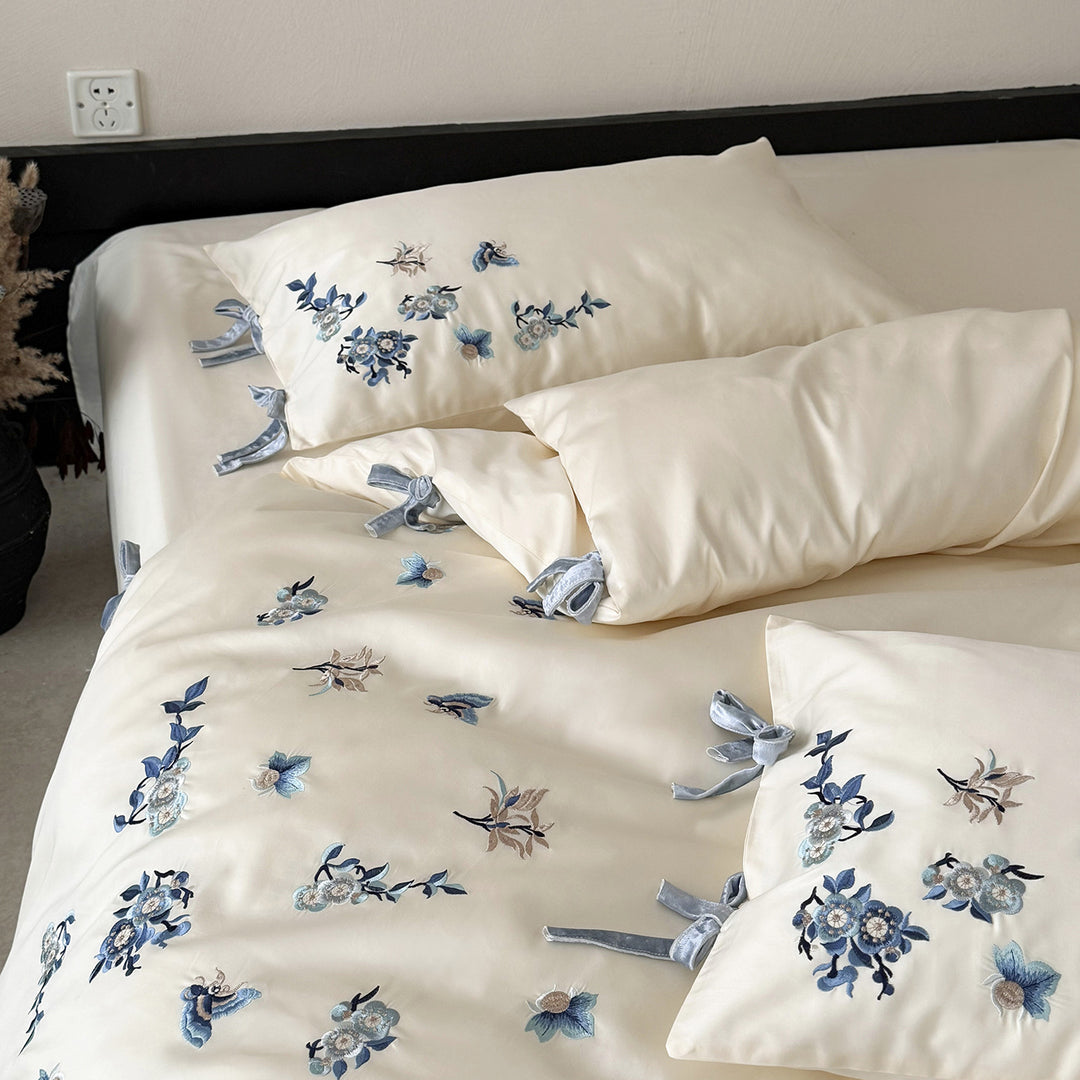 Luxury Cotton Sateen Bed Linen Set with Hand-Style Blue Floral Embroidery & Bow-Tie Shams