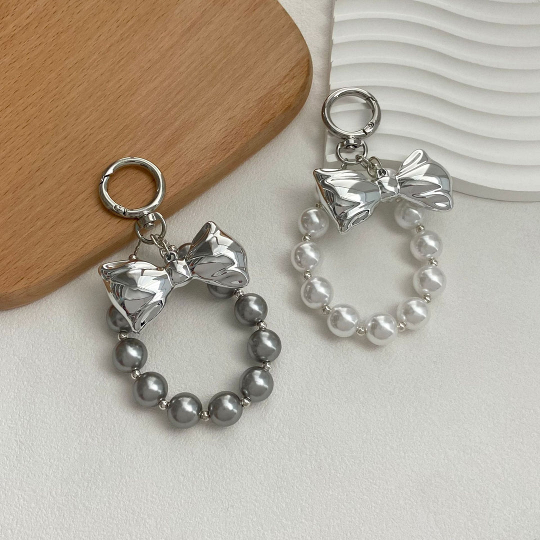 Elegant Pearl Bow Keychain Stornfield