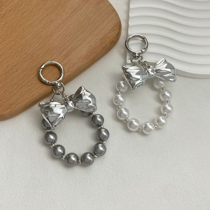 Elegant Pearl Bow Keychain Stornfield
